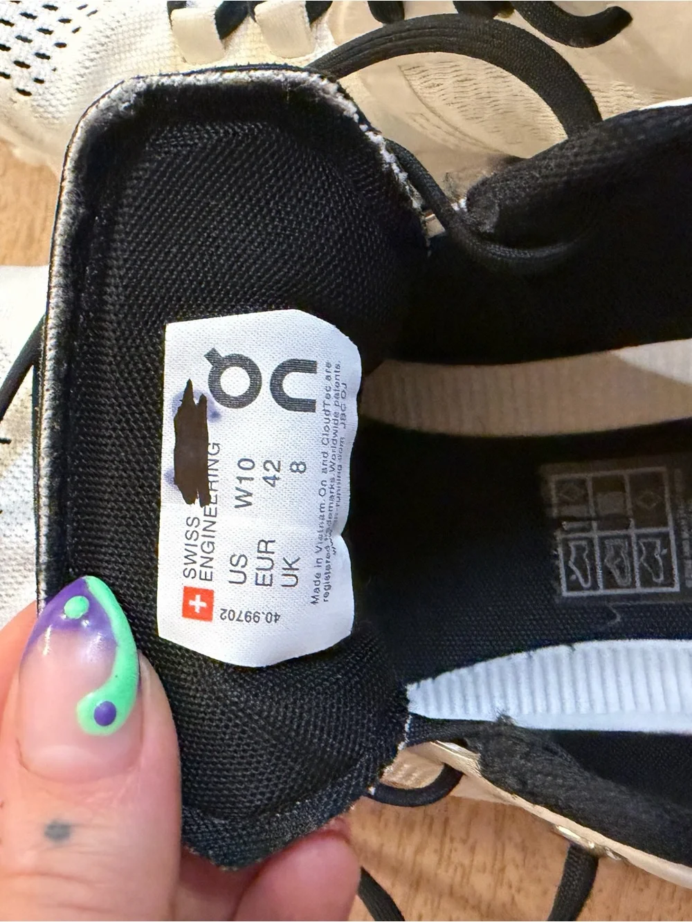 On Women’s Running Shoe — White with Black Accents